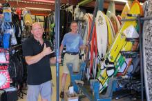 Kevin renting gear to Barrett at Hawiian Is. Surf &amp; Sport