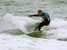 Surfer showing winning moves