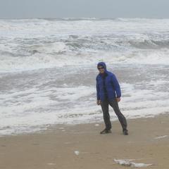 Barrett leaning into 40 - 55 mph wind on the ocean beach