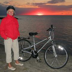 18 Peggy enjoying sunset along 13 mile Presque Isle bike path